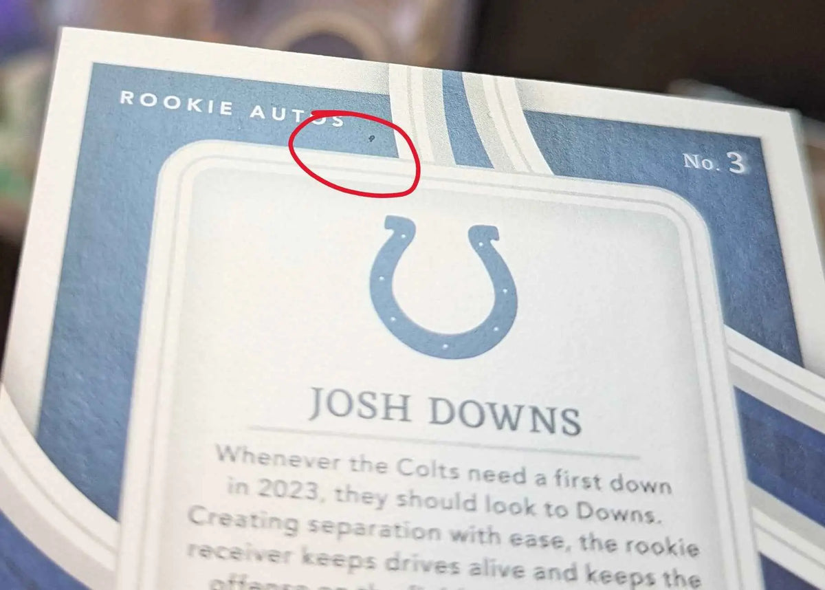 Blauer indianapolis colts rookie card von josh downs mit weißem rand und dem teamlogo horseshoe
