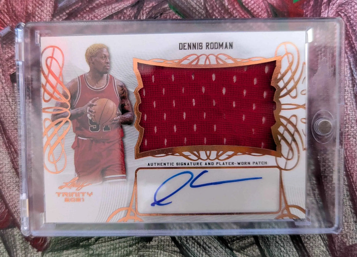 Dennis Rodman 2021 Leaf Trinity trading card mit authentischer signatur und spielergetragenem patch im schutzetui