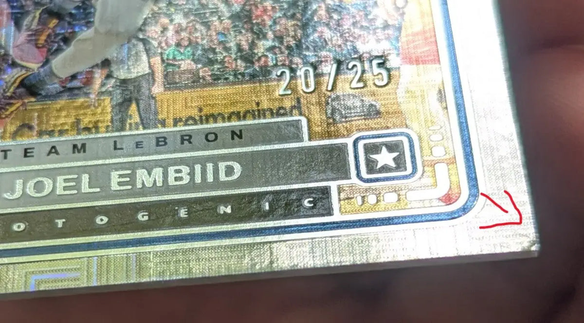 Silver holographic joel embiid trading card with gold blue border from 2023-24 panini photogenic all-star maze 20/25, related to panini revolution lava and cole anthony
