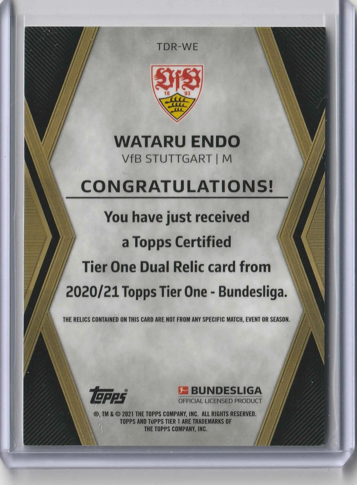 Dies ist eine silberne und schwarze tdr-we topps tier one dual relic karte mit goldenen geometrischen akzenten von wataru endo